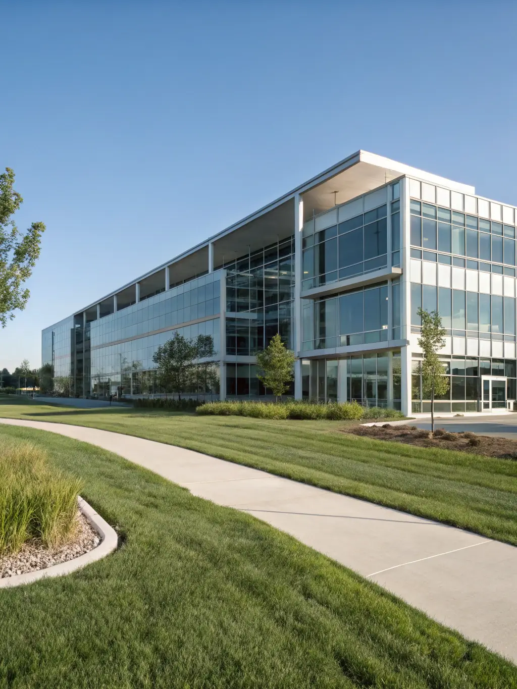 An exterior shot of a newly built commercial office building with a modern facade, reflecting Hunter Paige Construction's expertise in commercial construction.